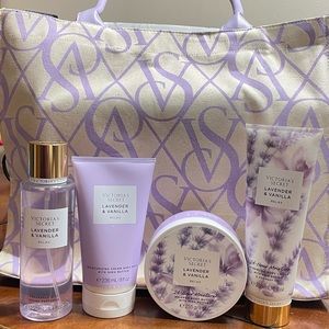 Victoria Secret bag with some beauty products is side